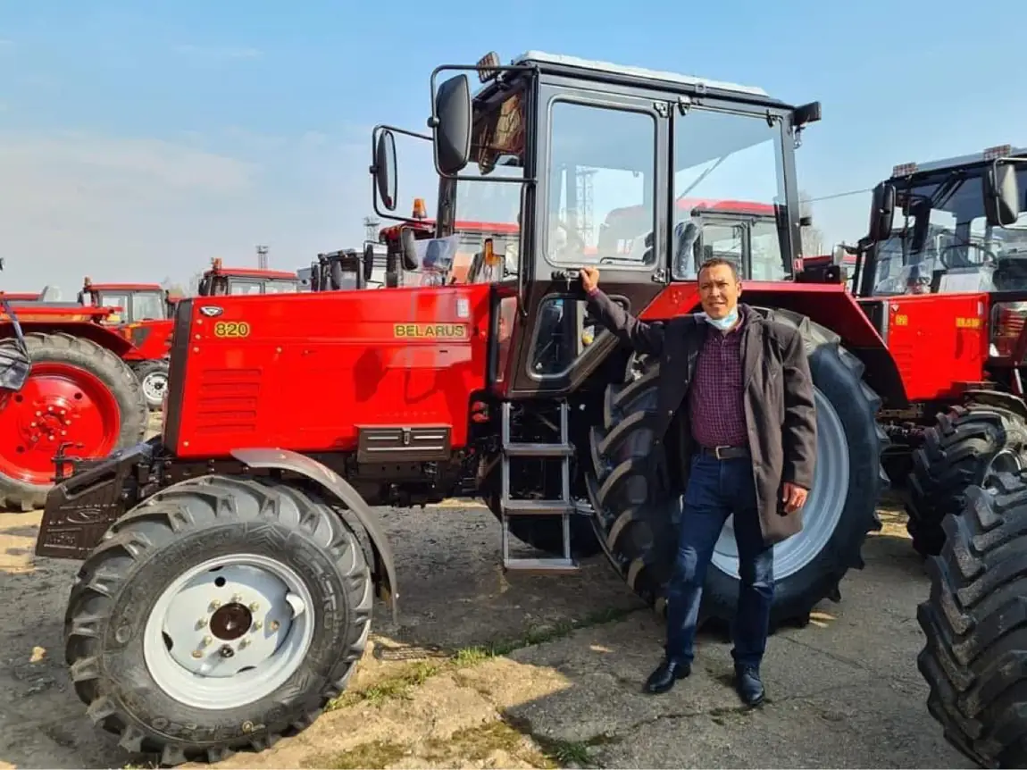 Red BELARUS 820 tractor with enclosed cabin