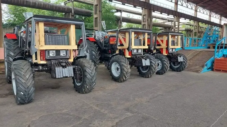Row of new red Belarus tractors at the MTZ factory